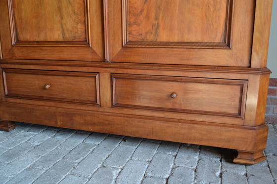 Image 1 of Large Sleek Antique Mahogany Cupboard.