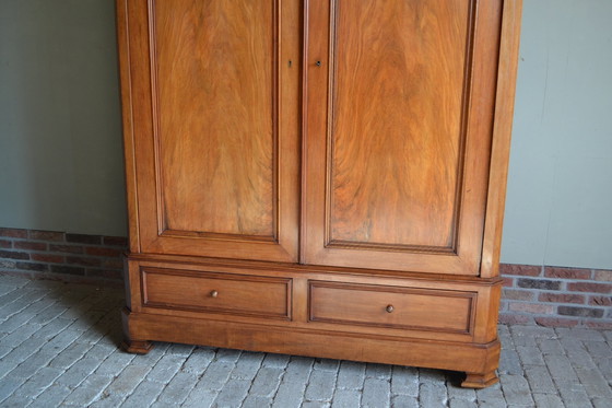 Image 1 of Large Sleek Antique Mahogany Cupboard.