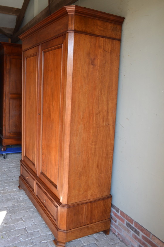 Image 1 of Large Sleek Antique Mahogany Cupboard.