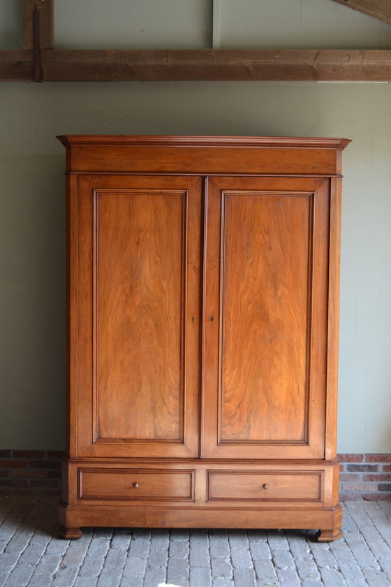 Image 1 of Large Sleek Antique Mahogany Cupboard.