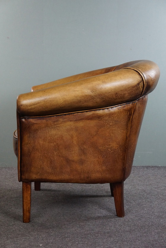 Image 1 of Sheep leather club chair, in good condition