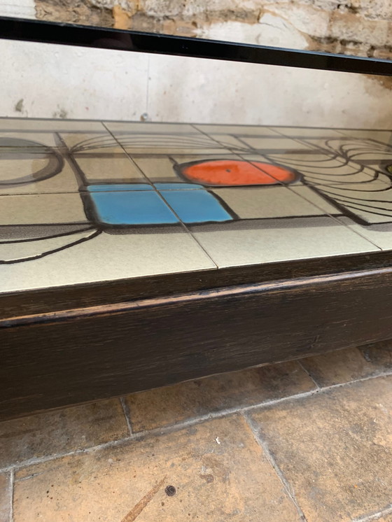 Image 1 of Coffee table from the 1960s/70s in dark stained wood, ceramic tiles and original smoked glass top