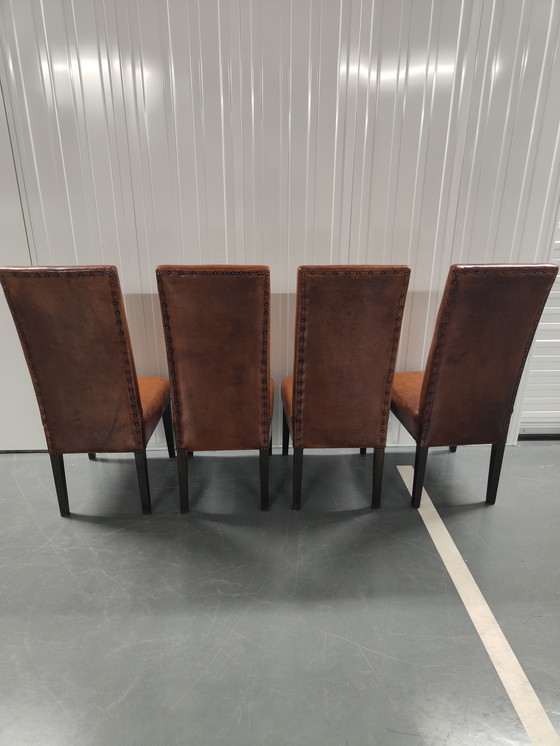 Image 1 of 4x Sheep leather chairs and wood legs