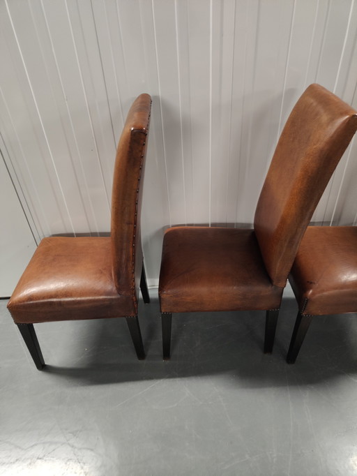 4x Sheep leather chairs and wood legs