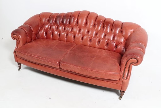 Image 1 of Chesterfield sofa on wheels