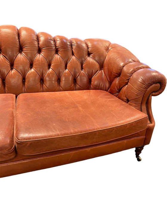 Image 1 of Chesterfield sofa on wheels