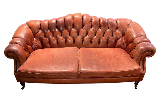 Image 1 of Chesterfield sofa on wheels