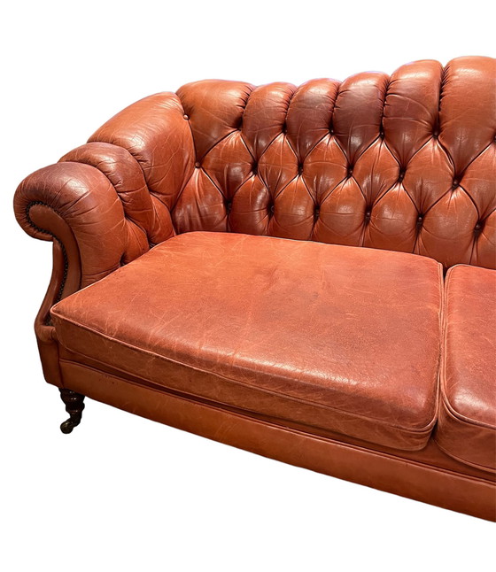 Image 1 of Chesterfield sofa on wheels