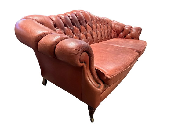 Image 1 of Chesterfield sofa on wheels