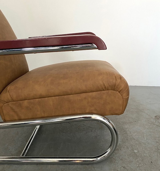 Image 1 of tubular chrome armchair