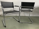 2 sedie vintage con struttura tubolare nera