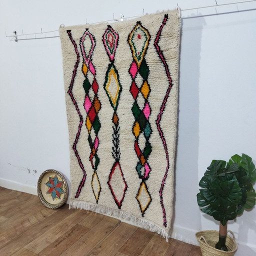Small Moroccan Berber wool rug with several colors