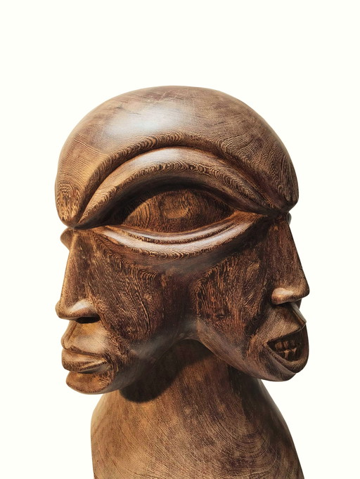 4D face wooden sculpture