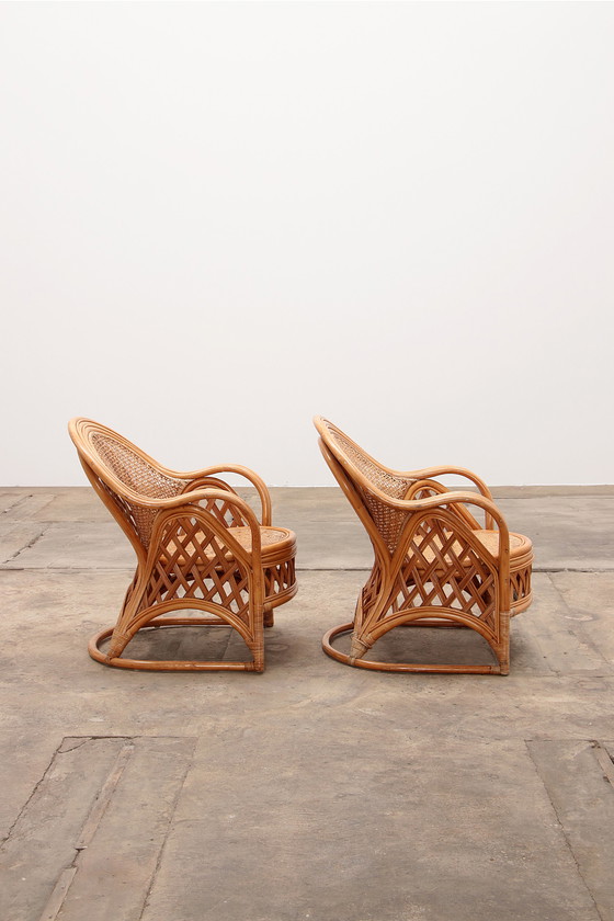 Image 1 of Ensemble de 2 chaises en bambou de style bohème français 1960.