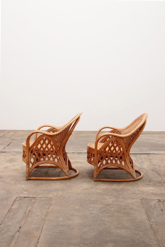 Image 1 of Ensemble de 2 chaises en bambou de style bohème français 1960.