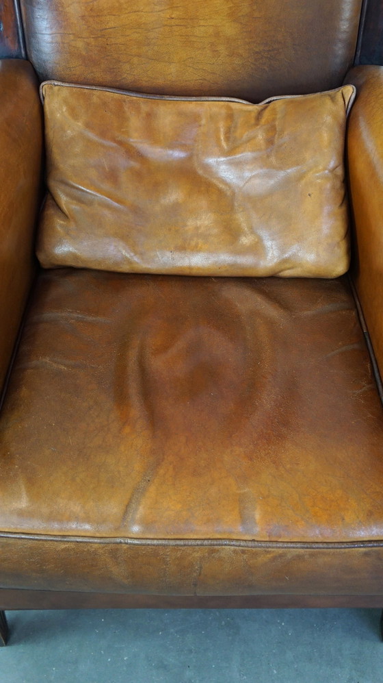 Image 1 of 2 x Sheep leather Artdeco armchair with high back