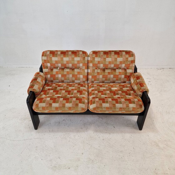 Image 1 of Vintage 2-seater sofa in black wood and multi-colored fabric, Italy 1980