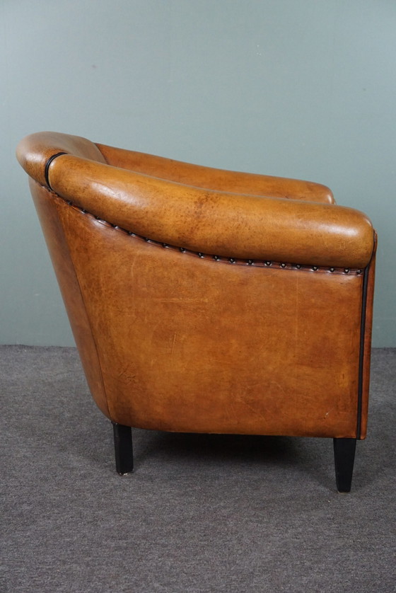 Image 1 of Light sheep leather club chair with black piping