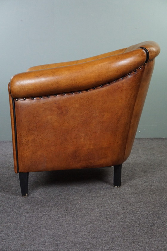 Image 1 of Light sheep leather club chair with black piping