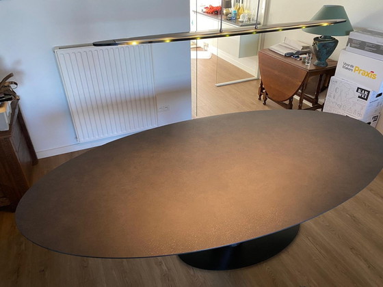 Image 1 of Bree's New World. Dining Table 169 Libra Oval + 6 Armchairs 283 Tanto Stainless Steel