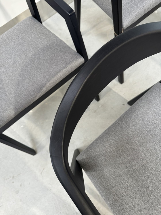 Image 1 of Black wooden dining chairs with gray seat cushion (4 pieces)