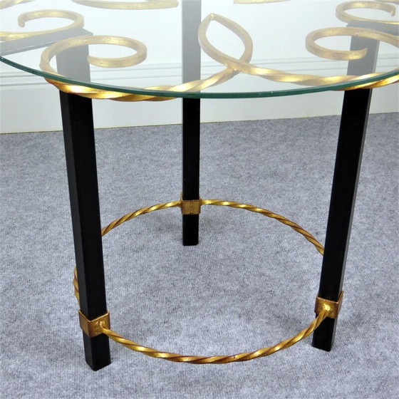Image 1 of Black and gold metal pedestal table with vintage glass top, 1950