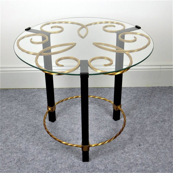 Image 1 of Black and gold metal pedestal table with vintage glass top, 1950