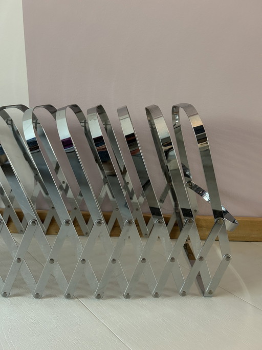 Chrome Harmonica Magazine Rack Designed By Luther Evans For Present Time