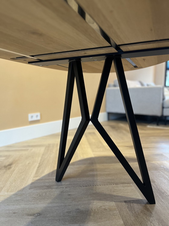 Image 1 of Butterfly Design Dining Table - Blob Steel With Black Frame & Oak Table Top