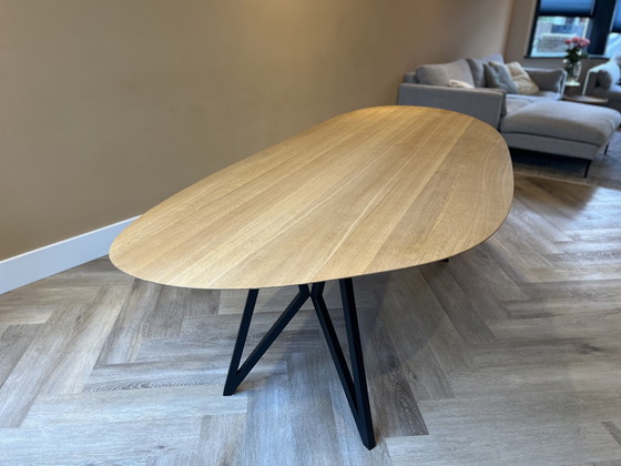 Image 1 of Butterfly Design Dining Table - Blob Steel With Black Frame & Oak Table Top