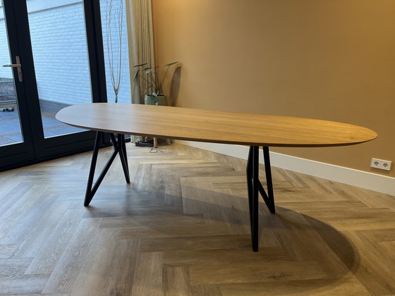 Image 1 of Butterfly Design Dining Table - Blob Steel With Black Frame & Oak Table Top