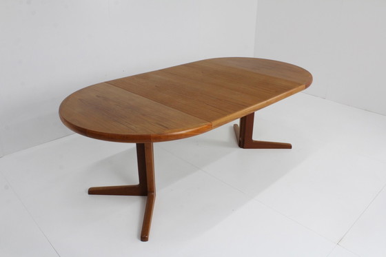 Image 1 of Danish round extendable dining table