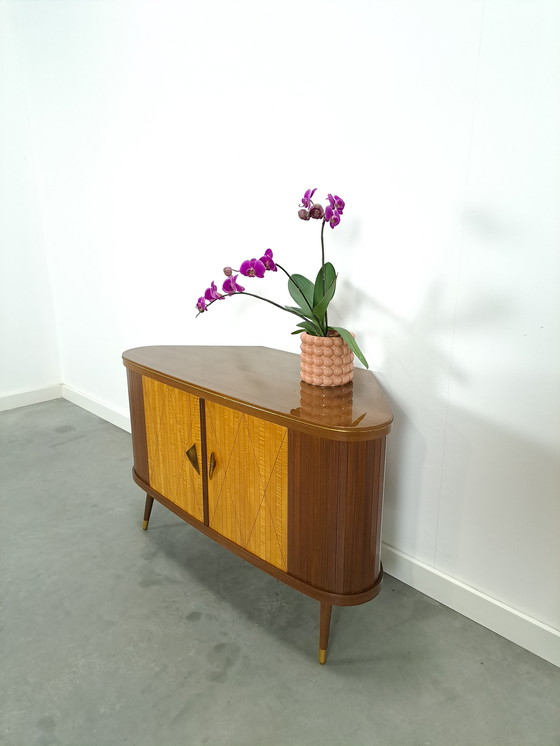 Image 1 of Bar cabinet with swivel bar and mirror wall