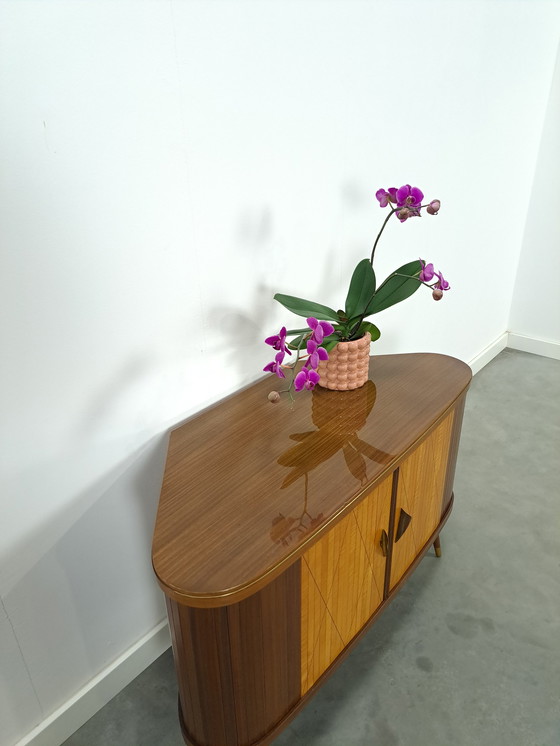 Image 1 of Bar cabinet with swivel bar and mirror wall