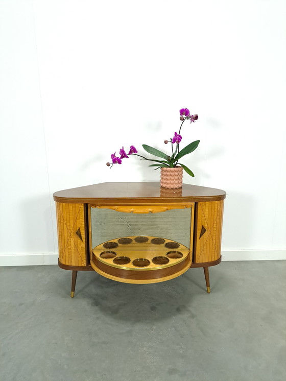 Image 1 of Bar cabinet with swivel bar and mirror wall