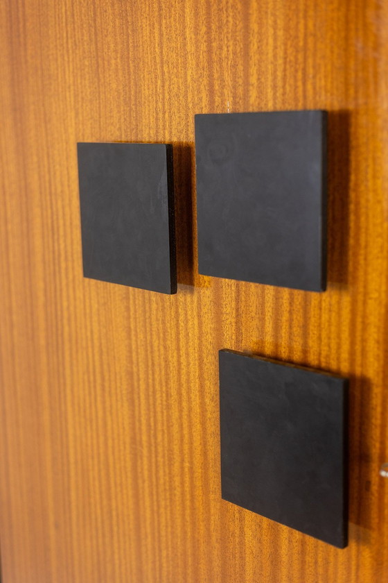 Image 1 of Pair of Mahogany Veneered and Black Lacquered Iron Cabinets. Circa 1950.