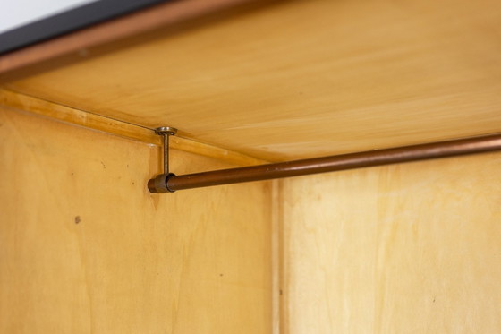 Image 1 of Pair of Mahogany Veneered and Black Lacquered Iron Cabinets. Circa 1950.