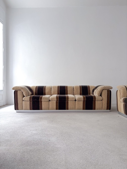 Dreamy Long 70S designer sofa with stainless steel frame in brown tones | Bauhaus