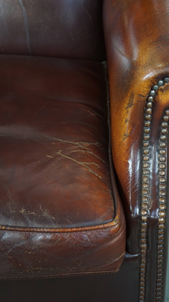 Image 1 of Sillón orejero de piel de oveja