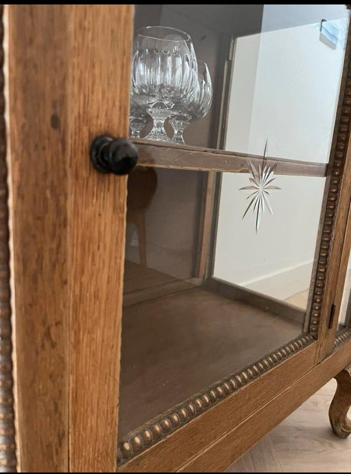 Wooden tea cabinet / display case with cut glass and shelf