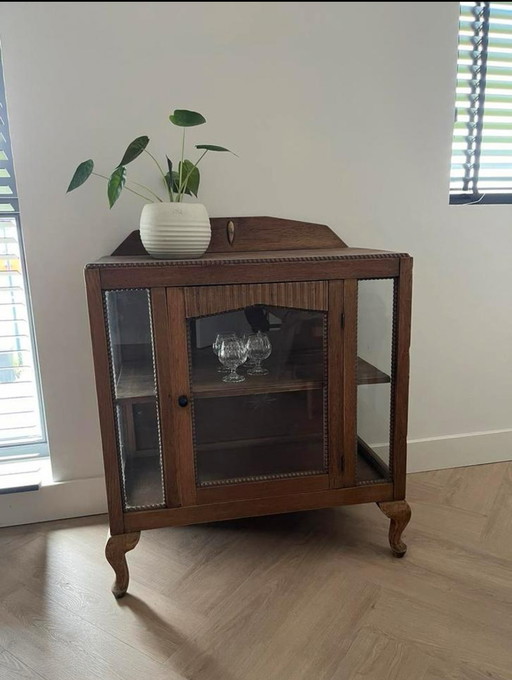 Wooden tea cabinet / display case with cut glass and shelf