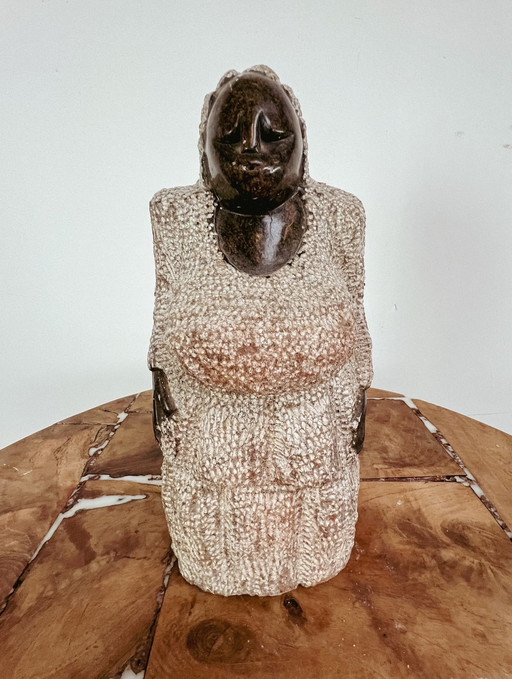 Serpentine statue of a lady from Zimbabwe