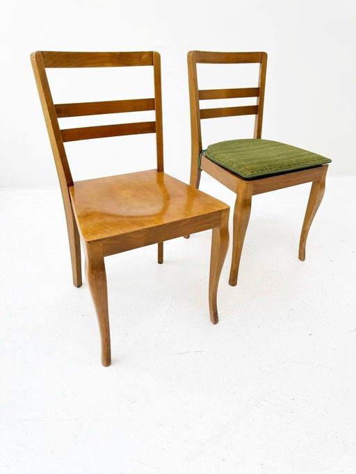 Set of 2 stain chairs with green seat cushions