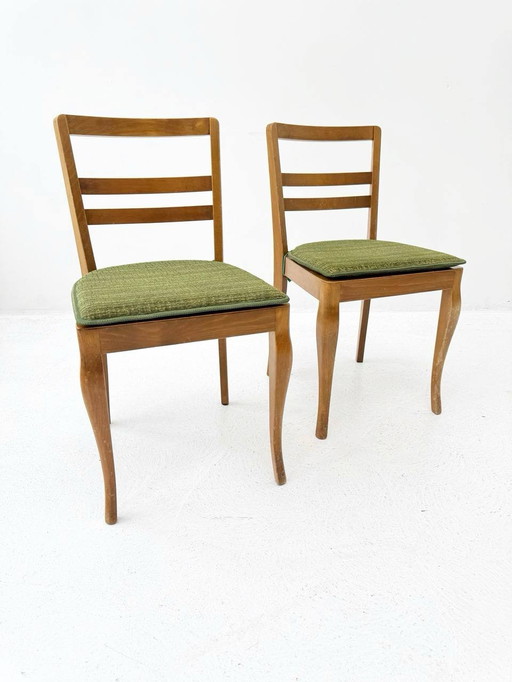 Set of 2 stain chairs with green seat cushions