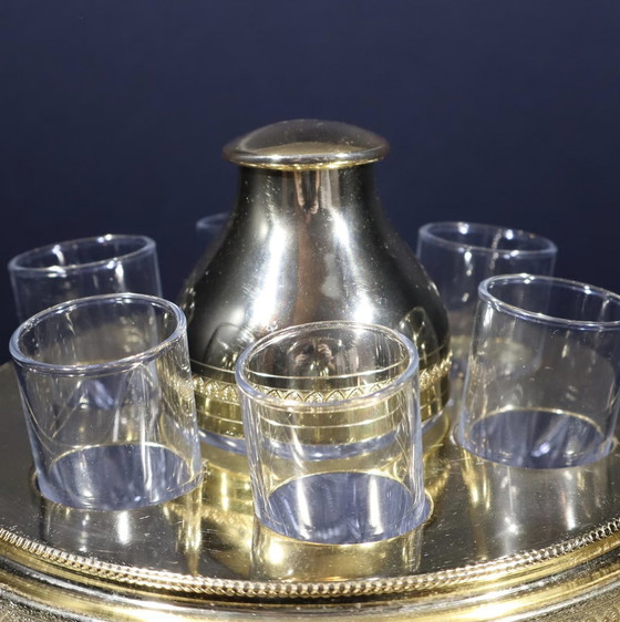 Image 1 of Moulded And Cut Crystal Liqueur Or Vodka Cellar Shaped With A Sphere Mounted On A Base Decorated With 3 Gilded Brass Dolphins