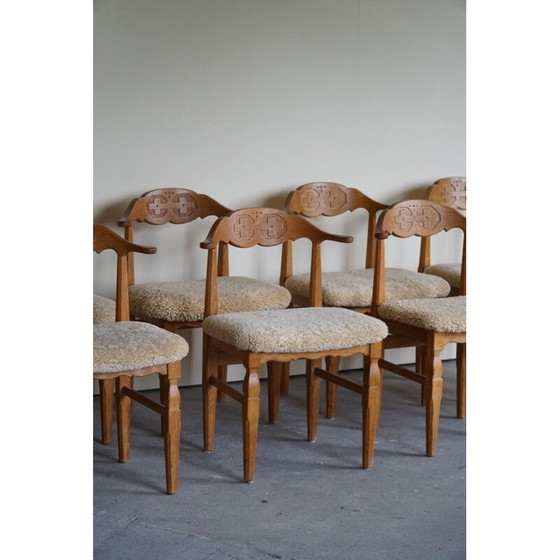 Image 1 of Set of 10 vintage dining chairs in oakwood and reupholstered in lambswool by Henning Kjærnulf, 1960s