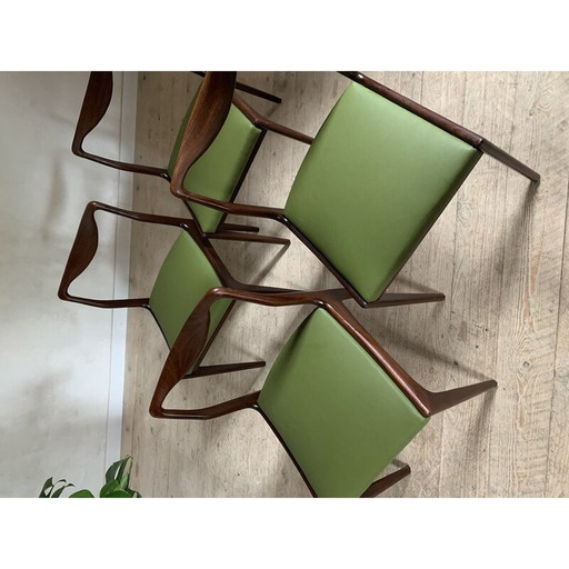 Set of 4 vintage green faux leather chairs