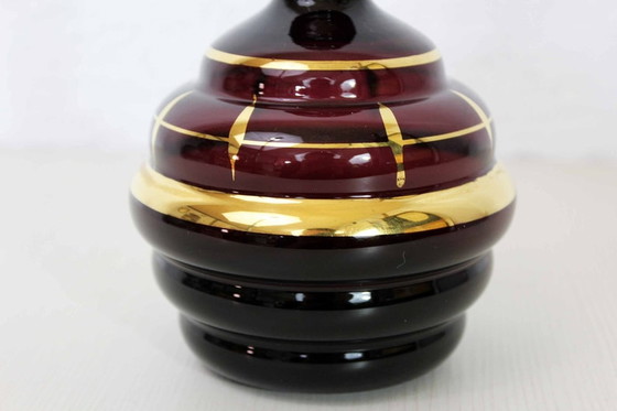 Image 1 of Decanter vintage in vetro fumé e dorato