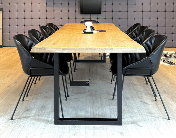 Image 1 of Dining table with oak tree trunk top on metal U-leg