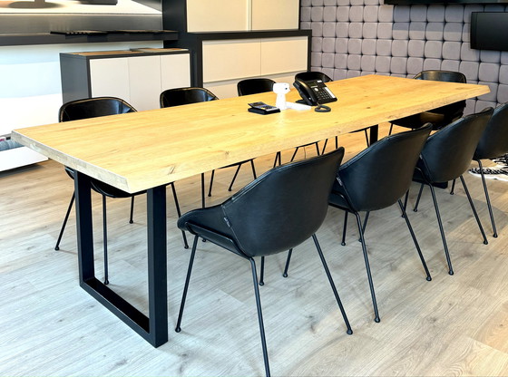 Image 1 of Dining table with oak tree trunk top on metal U-leg